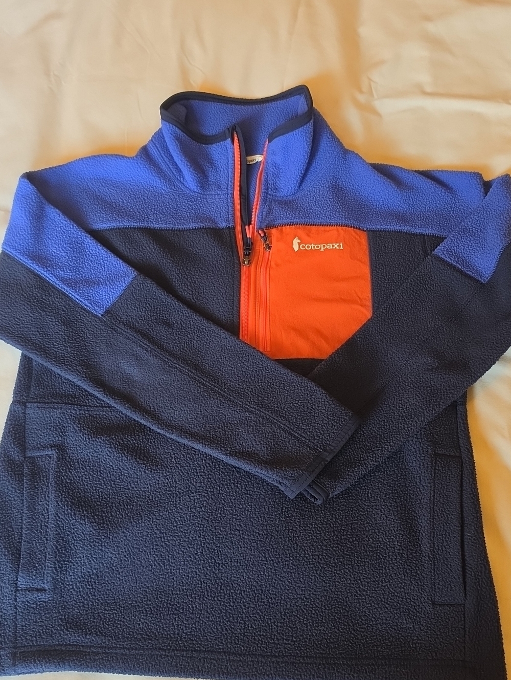 cotopaxi Navy and Royal Blue Quarter‑Zip Fleece with Orange Chest Pocket
